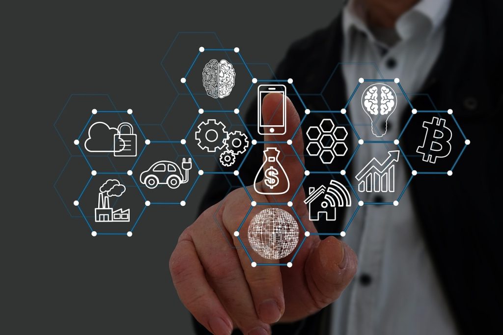 Dedo tocando uma interface digital com elementos de conexão, engrenagens e referências visuais a blockchain e finanças.